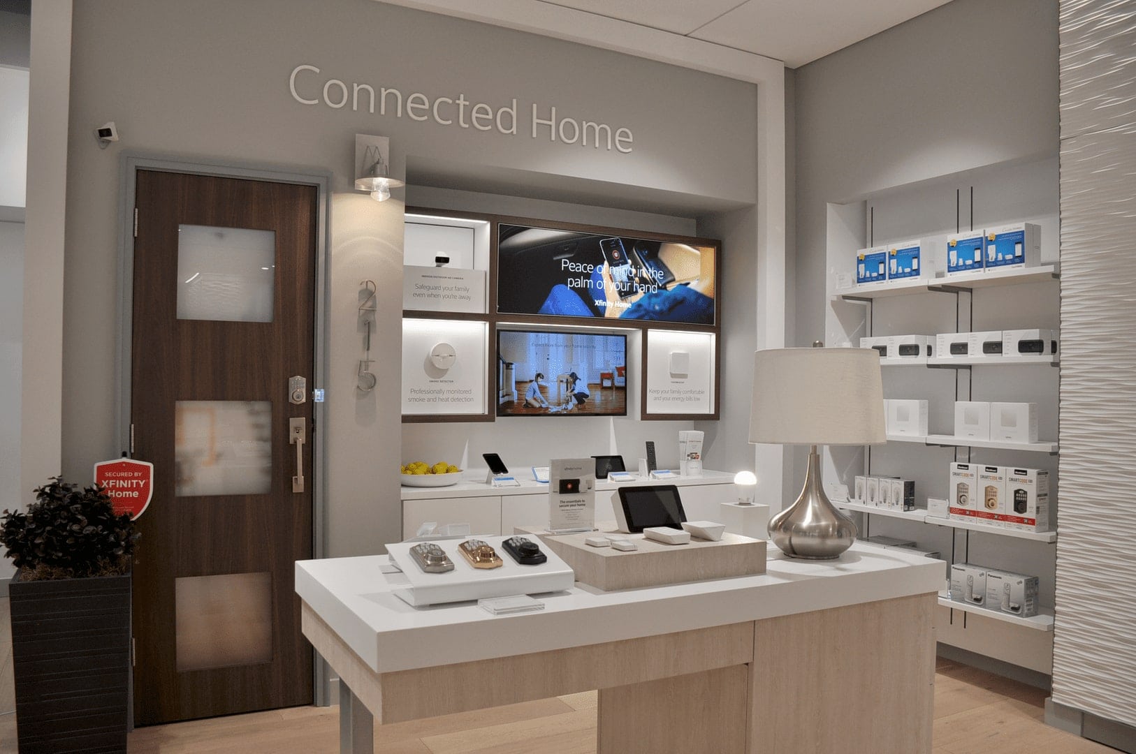 The inside of an Xfinity Comcast store which has connected home devices on display