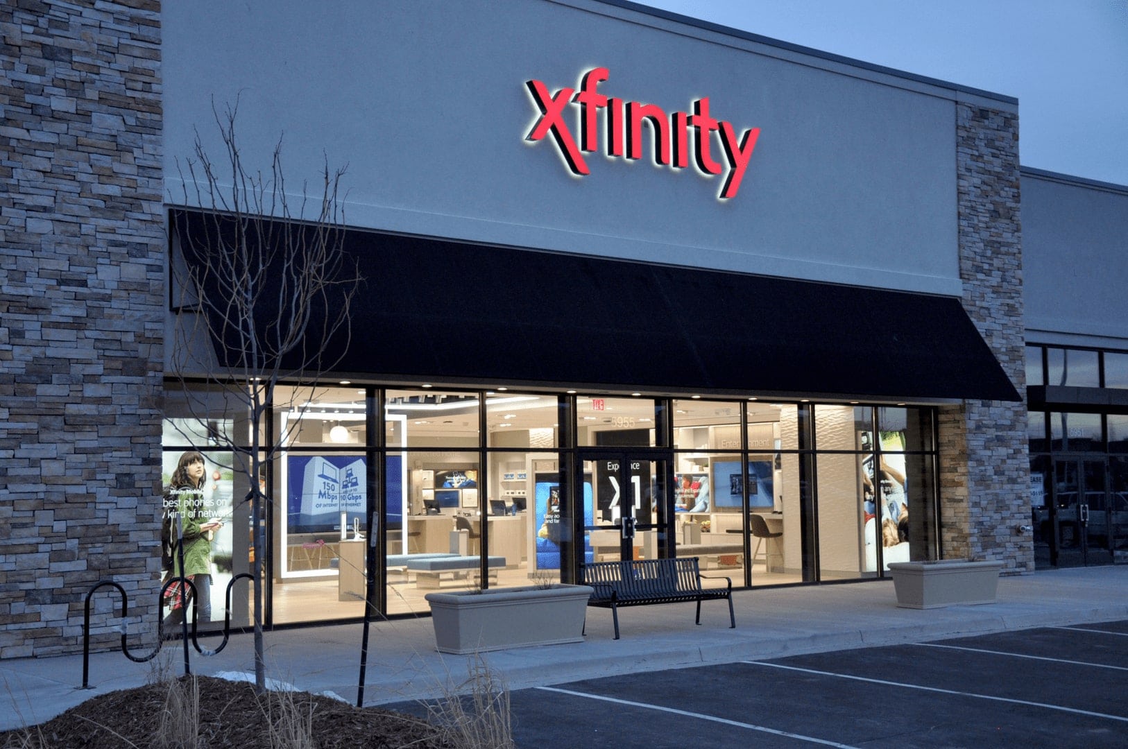 The exterior of an Xfinity Comcast store at night