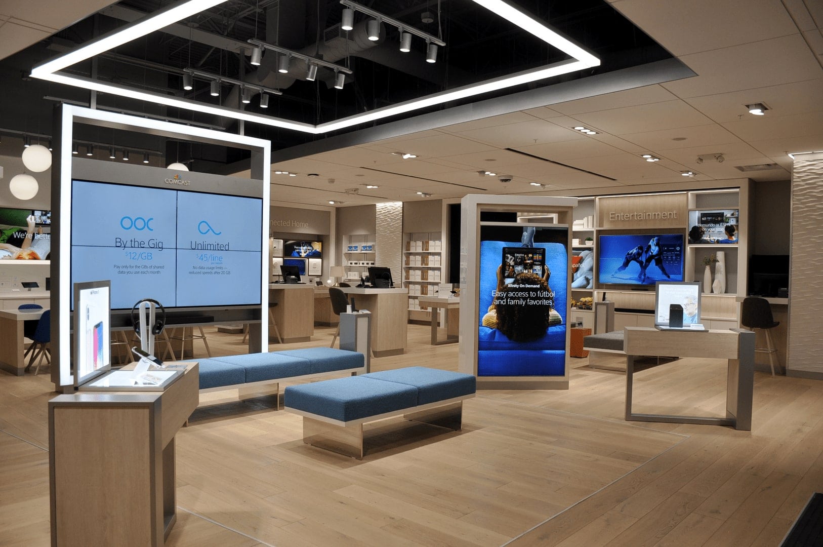 A beautifully designed interior of an Xfinity Comcast store that looks modern